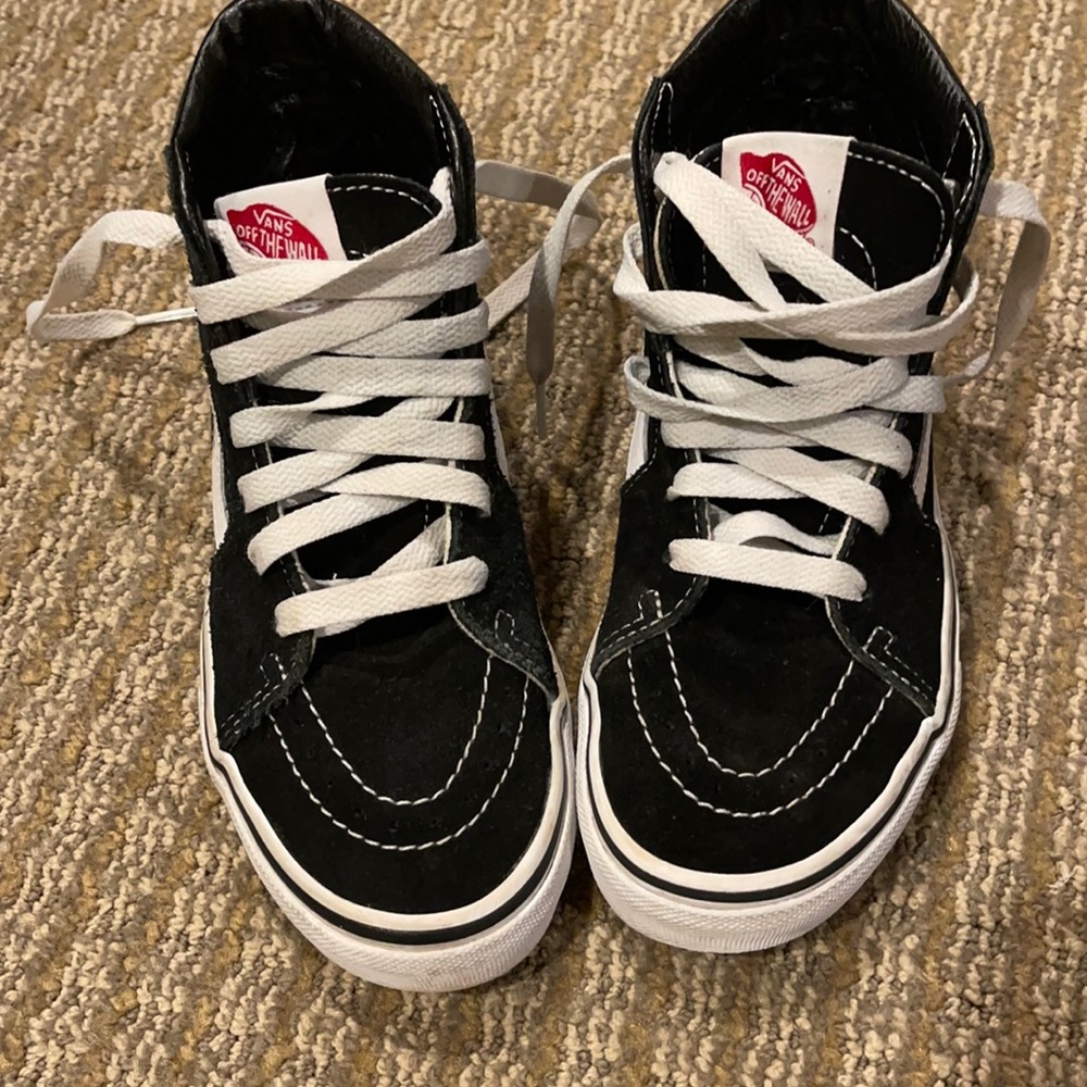 Kids Black/white suede and fabric high top sneakers.